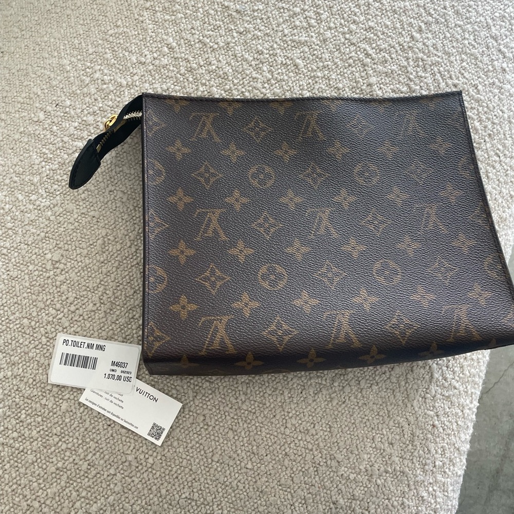 Louis Vuitton Poche Toilette NM brand new with tag